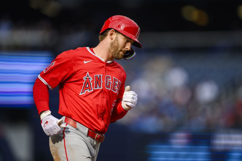 Los Angeles Angels' Taylor Ward rounds third base after hitting a home run during ninth inning during a baseball game against the Toronto Blue Jays in Toronto, Saturday, Aug. 24, 2024. (Christopher Katsarov/The Canadian Press via AP)