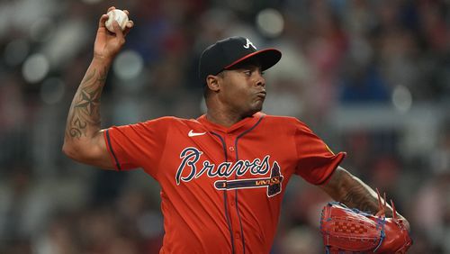 Atlanta Braves relief pitcher Raisel Iglesias works against the Toronto Blue Jays in the ninth inning of a baseball game Friday, Sept. 6, 2024, in Atlanta. (AP Photo/John Bazemore)