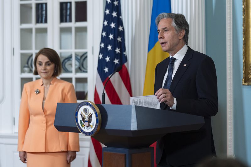Secretary of State Antony Blinken with Romanian Foreign Minister Luminița-Teodora Odobescu, left, speaks during a ceremony in the Treaty Room at the State Department, Friday, June 21, 2024, in Washington. (AP Photo/Manuel Balce Ceneta)