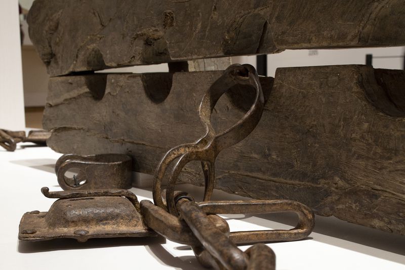 FILE - Tronco, or multiple foot stocks used to to constrain enslaved people, are seen at the Slavery exhibition Rijksmuseum in Amsterdam, Netherlands, May 17, 2021. (AP Photo/Peter Dejong, File)