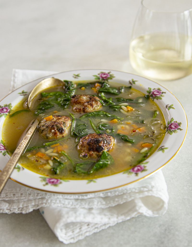 You can add some warmth to winter days with Italian Wedding Soup, adapted from a recipe in “Hot Little Suppers” by Carrie Morey (Harper Horizon, $34.99). (Courtesy of Angie Mosier)