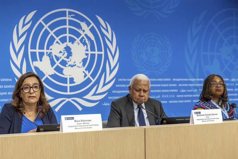 From left, United Nations Fact-Finding Mission's expert member Mona Rishmawi, left, its chair Mohamed Chande Othman and expert member Joy Ngozi Ezeilo present its first investigative report to the media during a press conference at the European headquarters of the United Nations in Geneva, Switzerland, Friday, Sept. 6, 2024. (Salvatore Di Nolfi/Keystone via AP)