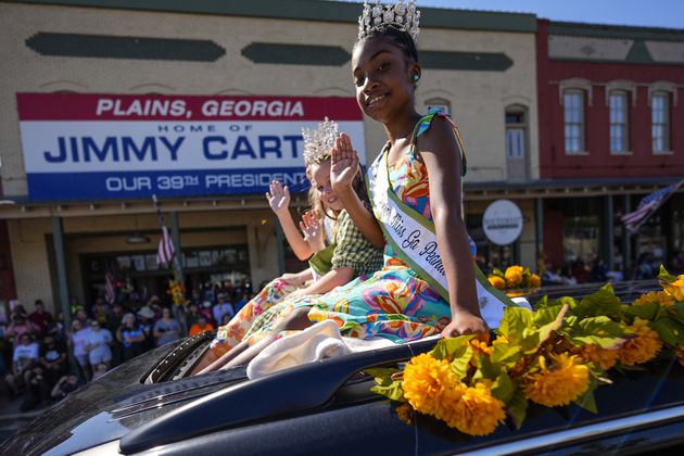 A float moves down main street during the 26th annual Plains Peanut Festival, ahead of former President Jimmy Carter's birthday on Oct. 1, Saturday, Sept. 28, 2024, in Plains, Ga. Carter didn't attend the festival. (AP Photo/Mike Stewart)