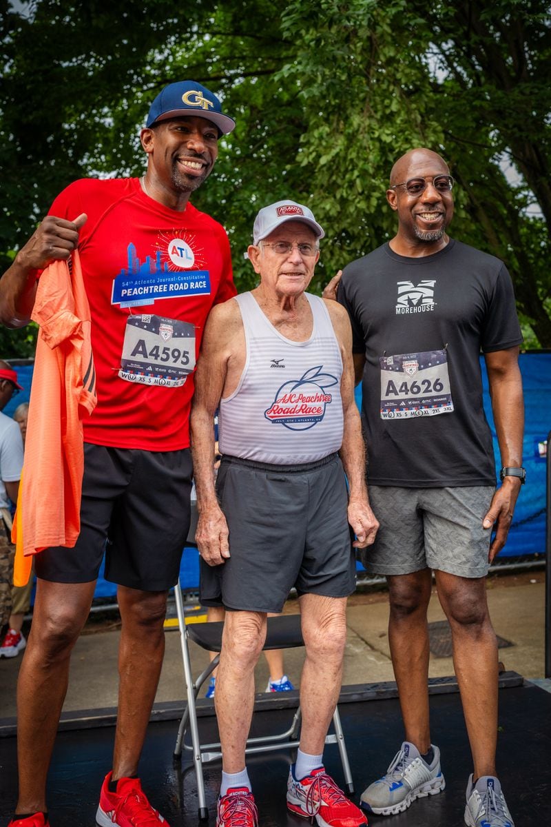 Atlanta Mayor Andre Dickens, Peachtree Road Race legend Bill Thorne and U.S. Sen. Raphael Warnock following the race in 2023. Courtesy of Matthew Timothy Demarko
