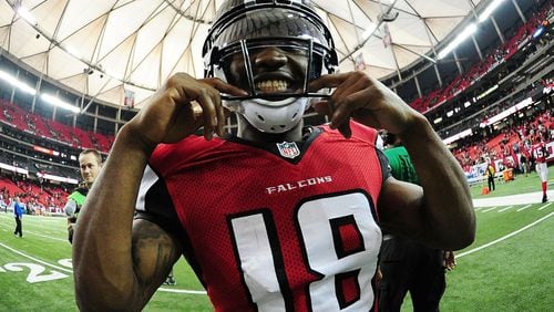 Smiles are in no short supply for Falcons receiver Taylor Gabriel these days, here celebrating a victory over Arizona. (Scott Cunningham/Getty Images)