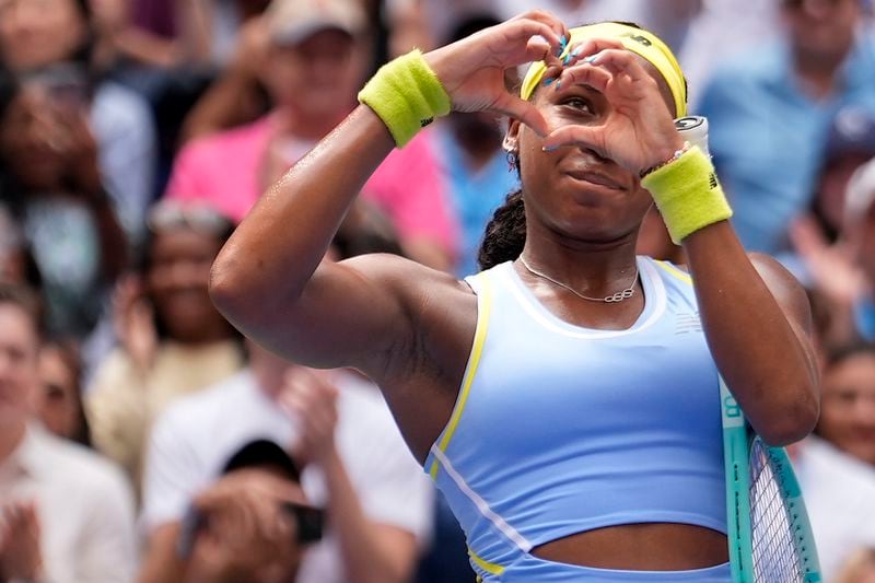 Coco Gauff, of the United States, motions to the crowd after defeating Elina Svitolina, of Ukraine, during the third round of the U.S. Open tennis championships, Friday, Aug. 30, 2024, in New York. (AP Photo/Seth Wenig)