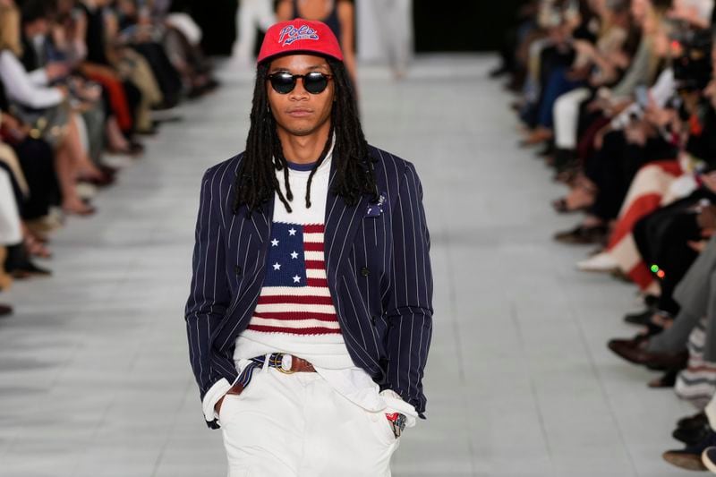 A model walks the runway during the Ralph Lauren Spring/Summer 2025 fashion show as part of New York Fashion Week on Thursday, Sept. 5, 2024, at Khalily Stables in Bridgehampton, N.Y. (Photo by Charles Sykes/Invision/AP)