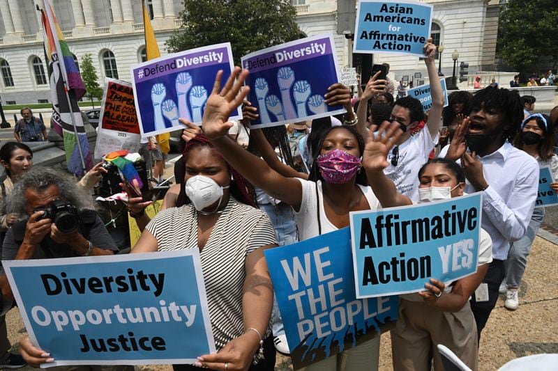 
                        Demonstrators react to the affirmative action opinion outside the U.S. Supreme Court in Washington, June 29, 2023. The Supreme Court on Thursday ruled that the race-conscious admissions programs at Harvard and the University of North Carolina were unlawful, curtailing affirmative action at colleges and universities around the nation, a policy that has long been a pillar of higher education. (Kenny Holston/The New York Times)
                      