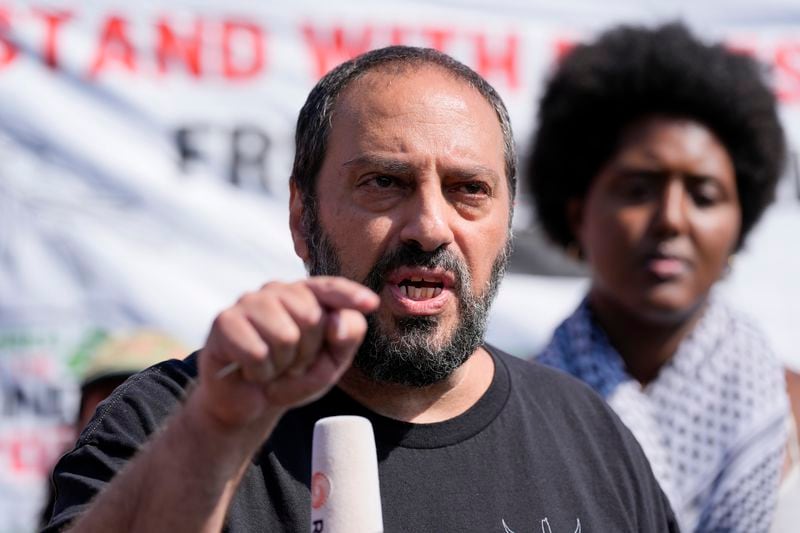 Hatem Abudayyeh, of the US Palestinian Community Network, speaks prior to a march to the Democratic National Convention Monday, Aug. 19, 2024, in Chicago. (AP Photo/Alex Brandon)