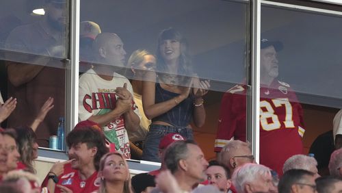 Taylor Swift is seen in a suite before the start of an NFL football game between the Kansas City Chiefs and the Baltimore Ravens Thursday, Sept. 5, 2024, in Kansas City, Mo. (AP Photo/Ed Zurga)