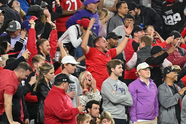 Georgia Bulldogs fans celebrate during the first half of the College Football Playoff National Championship at SoFi Stadium in Los Angeles on Monday, January 9, 2023. (Hyosub Shin / Hyosub.Shin@ajc.com)