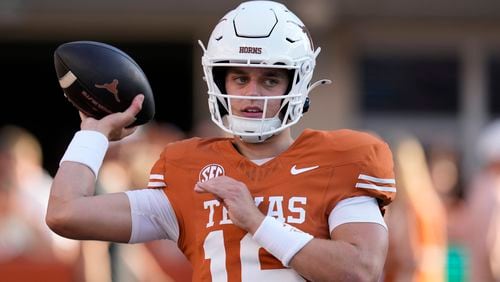 Texas quarterback Arch Manning throws before an NCAA college football game against Louisiana Monroe in Austin, Texas, Saturday, Sept. 21, 2024. (AP Photo/Eric Gay)