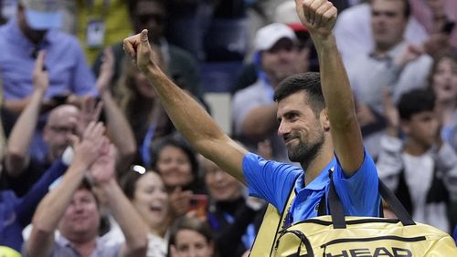 Novak Djokovic, of Serbia, reacts against Alexei Popyrin, of Australia, during a third round match of the U.S. Open tennis championships, Friday, Aug. 30, 2024, in New York. (AP Photo/Julia Nikhinson)