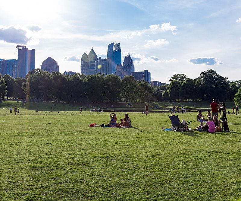 The Meadow at Piedmont Park is a popular Atlanta picnic destination with beautiful Midtown skyline views.