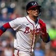 Atlanta Braves' Orlando Arcia runs toward first base during the 10th inning of a baseball game against the Toronto Blue Jays, Sunday, Sept. 8, 2024, in Atlanta. (AP Photo/Erik Rank)