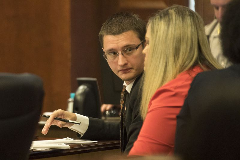 7/11/2019 -- McDonough, Georgia -- Joseph Rosenbaum (center) speaks with his wife Jennifer (right) during their trial in front of Henry County Chief Judge Brian Amero at the Henry County Superior courthouse, Thursday, July 11, 2019. (Alyssa Pointer/alyssa.pointer@ajc.com)