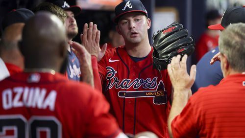 Atlanta Braves starting pitcher Jared Shuster greets teammates in the dugout after being removed from the mound during the sixth inning against the Colorado Rockies at Truist Park, Friday, June 16, 2023, in Atlanta. The Braves won 8-1. Jason Getz / Jason.Getz@ajc.com)