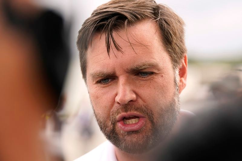 Republican vice presidential nominee Sen. JD Vance, R-Ohio, speaks to reporters before he departs Pitt-Greenville Airport following a campaign event in Greenville, N.C., Saturday Sept. 14, 2024. (AP Photo/Steve Helber)