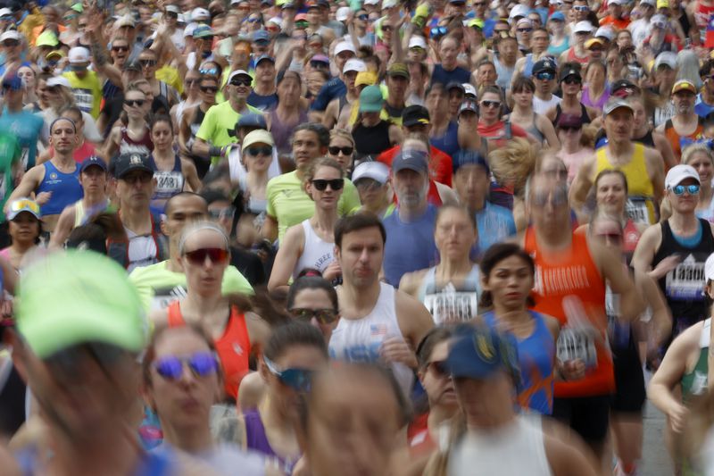 FILE - A wave a runners set out from the start of the Boston Marathon, Monday, April 15, 2024, in Hopkinton, Mass. (AP Photo/Mary Schwalm, File)