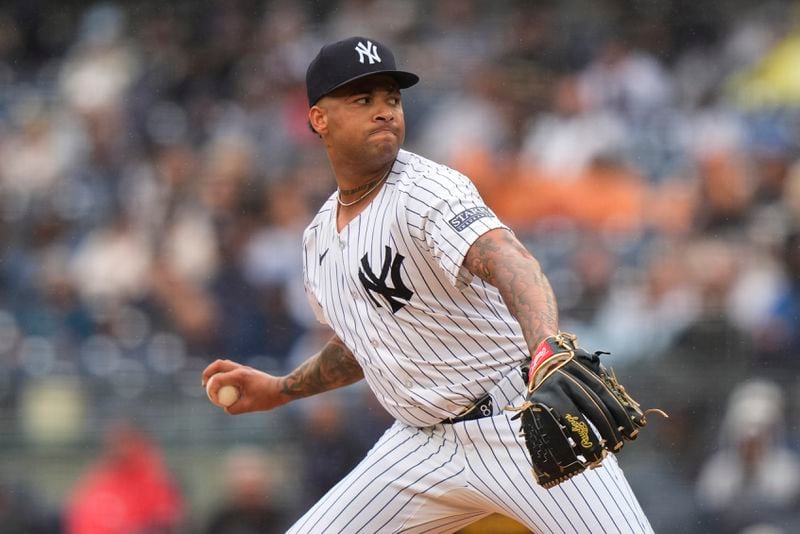 New York Yankees' Luis Gil pitches during the first inning of a baseball game against the Pittsburgh Pirates, Saturday, Sept. 28, 2024, in New York. (AP Photo/Frank Franklin II)