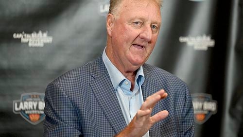 Indiana State University and Boston Celtics great Larry Bird explains how his former Springs Valley High School coach, Jim Jones, taught him to handle the ball during a press conference after the grand opening ceremony for the Larry Bird Museum, Thursday, May 30, 2024, in Terre Haute, Ind. (Joseph C. Garza/The Tribune-Star via AP)