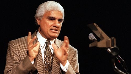 In this file photo, author and lecturer Ravi Zacharias spoke about religious truths to more than 1,400 people in the Center of the Performing Arts in Gainesville, FL. Zacharias challenged skeptics of Christianity by asking 'Can Man Live without God?' (Photo by BRIAN THORPE/The Gainesville Sun)
