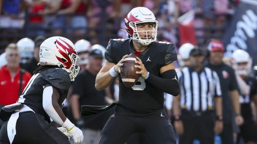 Milton quarterback Luke Nickel (5) attempts a pass during the first half against Buford at Milton High School, Friday, August 16, 2024, in Milton, Ga. (Jason Getz / AJC)
