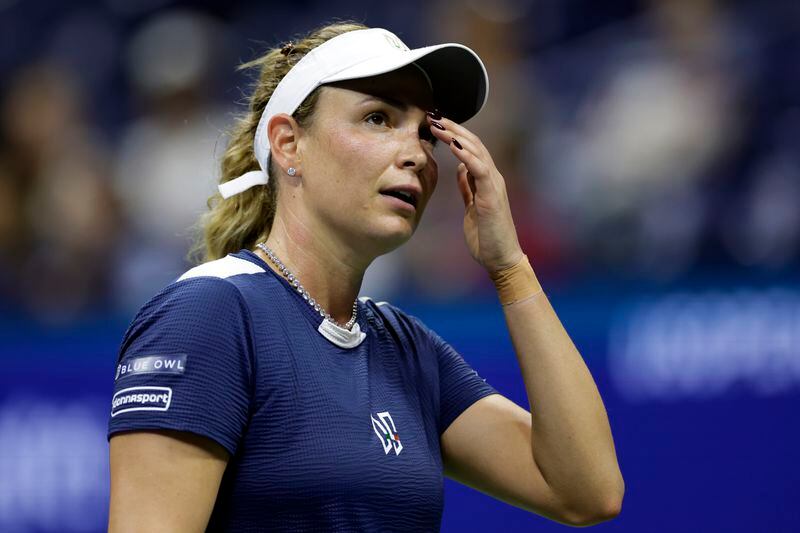 Donna Veki, of Croatia, reacts against Zheng Qinwen, of China, during the fourth round of the U.S. Open tennis tournament Monday, Sept. 2, 2024, in New York. (AP Photo/Adam Hunger)