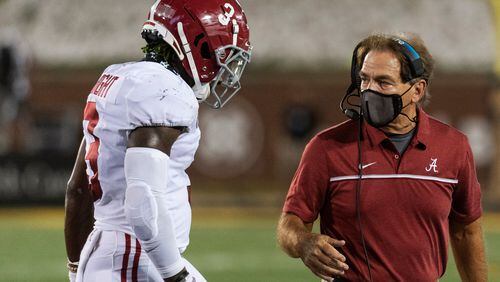 Alabama head coach Nick Saban (right) talks with Daniel Wright as he walks off the field during the second half against Missouri, Saturday, Sept. 26, 2020, in Columbia, Mo. (L.G. Patterson/AP)