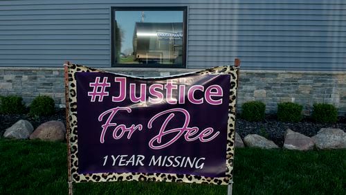 A banner calls for justice in the case of missing woman Dee Warner in Tipton, Mich. on Monday, May 9, 2022. (Jacob Hamilton/Jackson Citizen Patriot via AP)