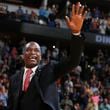 FILE - Retired Denver Nuggets center Dikembe Mutombo waves to the crowd as his jersey number was retired by the team during halftime of the Nuggets' NBA basketball game against the Portland Trail Blazers on Saturday, Oct. 29, 2016, in Denver. (AP Photo/David Zalubowski, File)