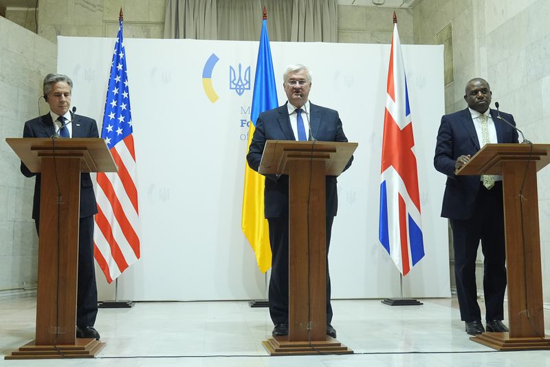 U.S. Secretary of State Antony Blinken, left, Britain's Foreign Secretary David Lammy, right, and Ukraine's Foreign Minister Andriiy Sybiha attend a joint news conference at the Ministry of Foreign Affairs in Kyiv, Ukraine, Wednesday, Sept. 11, 2024. (AP Photo/Mark Schiefelbein, Pool)