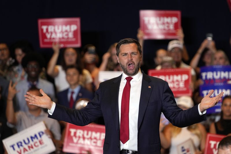 Republican vice presidential nominee Sen. JD Vance, R-Ohio, gestures to supporters at a campaign event, Thursday, Sept. 5, 2024, in Phoenix. (AP Photo/Matt York)