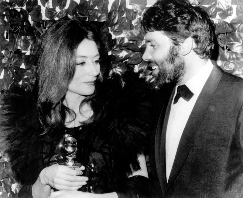 FILE - French actress Anouk Aimee poses with her husband, Lyricist Pierre Baruch, in Hollywood last night after the Hollywood foreign press association named her best actress of the year at the group's annual Golden Globes Awards Banquet. She won in the Drama Category for her role in "A man and a woman" on Feb. 1967..The film was named best foreign language film of the Year. French actress Anouk Aimée, winner of a Golden Globe for her starring role in "A Man and a Woman" by legendary French director Claude Lelouch, has died, her agent said Tuesday June 18, 2024. She was 92. (AP Photo, File)