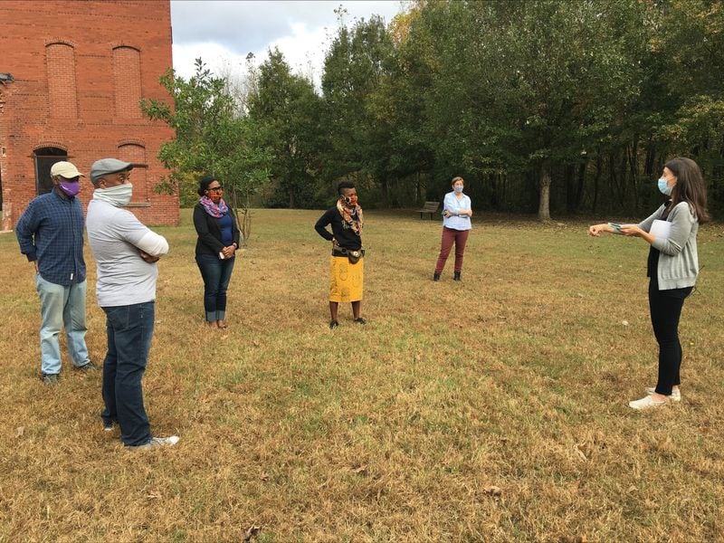 Group tour with Idle Crimes & Heavy Work collaborators and Community Visioners: Tambra Omiyale Harris, Veronica Jeffreys, Victoria Lemos, Robert Thompson, Lauren Neefe, David L. Garrett. On site at Whittier Mill Village Park