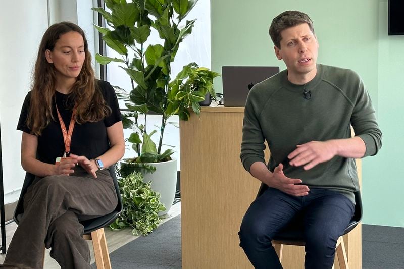 FILE - Sam Altman, right, CEO of ChatGPT maker OpenAI, and Mira Murati, chief technology officer, appear at OpenAI DevDay, OpenAI's first developer conference, on Nov. 6, 2023 in San Francisco. (AP Photo/Barbara Ortutay, File)