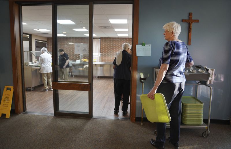 Sisters join for breakfast after prayer at the Mount St. Scholastica Benedictine monastery in Atchison, Kan., Wednesday, July 17, 2024. (AP Photo/Jessie Wardarski)