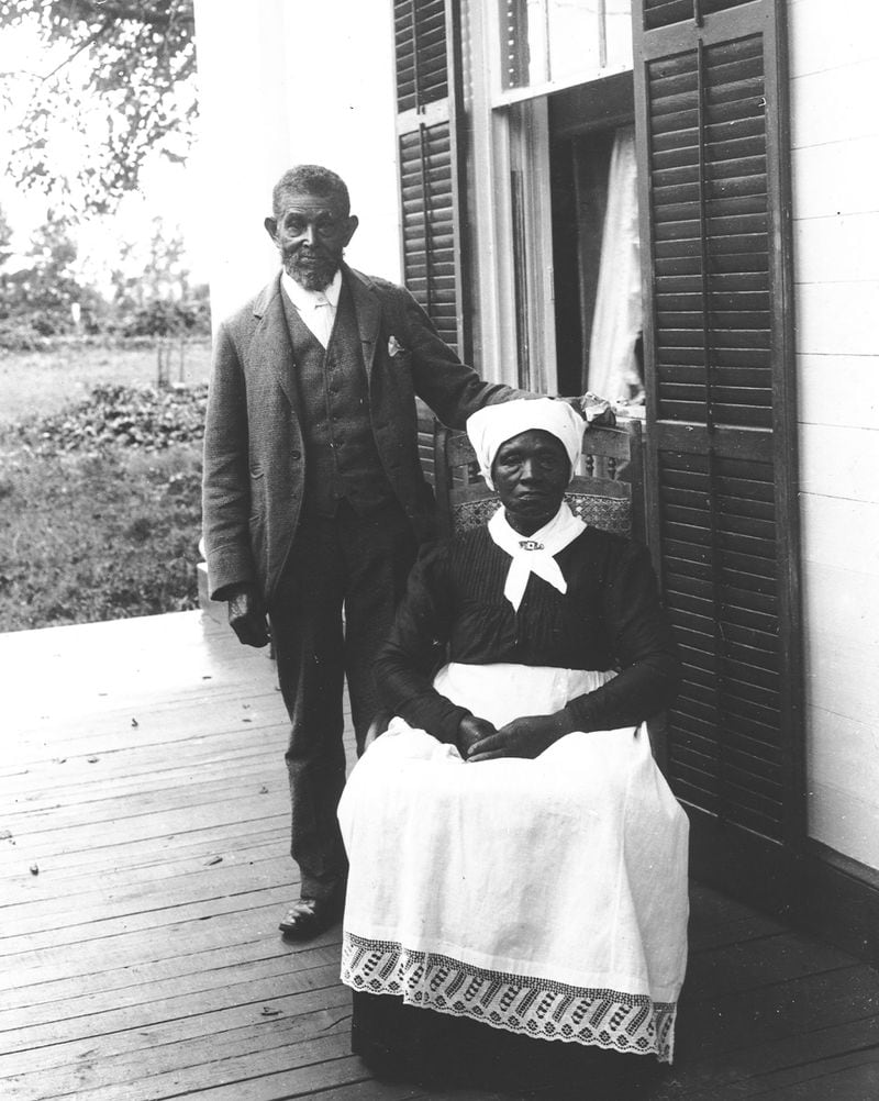 William Jackson and Grace Robinson were slaves for the Bulloch family, which owned what is now the Bulloch Hall historic home in Roswell. They were called Daddy William and Maum Grace. William was coachman and butler. Grace was the children's nursemaid. She is buried at Pleasant Hill Cemetery in Roswell. This photo was taken circa 1905 according to Roswell Archivist Elaine Deniro. Photo courtesy of Roswell Historical Society. 
