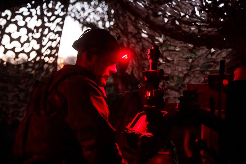 A Ukrainian serviceman of Liut brigade aims his D-30 artillery cannon during firing towards Russian positions near Toretsk, Donetsk region, Ukraine, Sunday Sept. 22, 2024. (AP Photo/Evgeniy Maloletka)