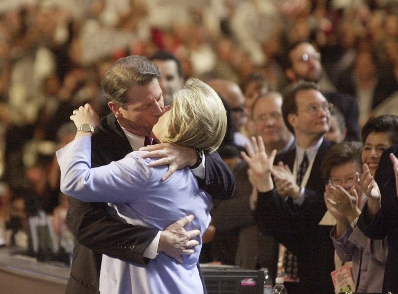 FILE - Democratic presidential nominee Al Gore kisses his wife, Tipper Gore on the stage at the Democratic National Convention, Aug. 17, 2000, in Los Angeles. (AP Photo/ David J. Phillip, File)