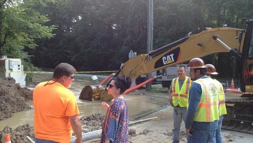 DeKalb County Commissioner Nancy Jester at the scene of the water main break on Saturday. (Credit: Nancy Jester Twitter account)