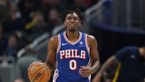 Philadelphia 76ers' Tyrese Maxey dribbles during the first half of an NBA basketball game against the Indiana Pacers, Thursday, Jan. 25, 2024, in Indianapolis. (AP Photo/Darron Cummings)