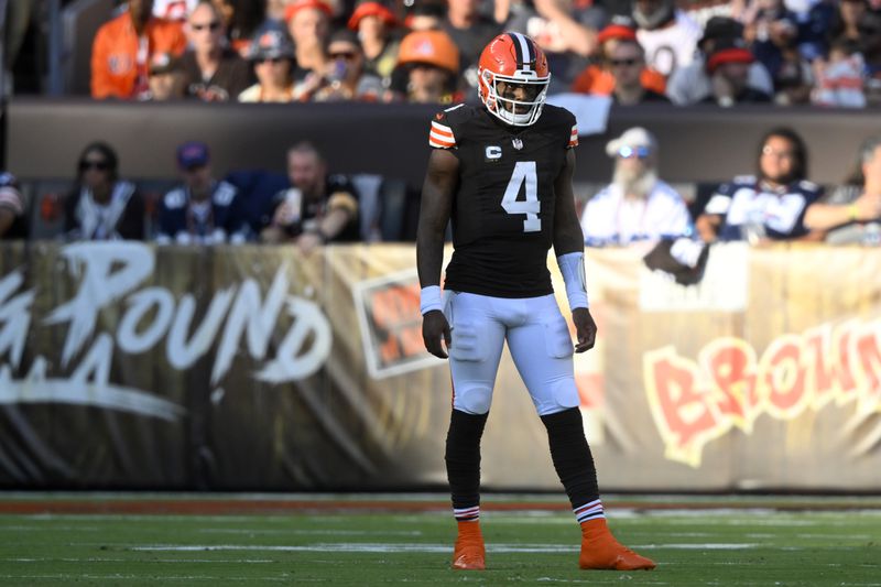 Cleveland Browns quarterback Deshaun Watson (4) stands on the field after throwing an incomplete pass in the second half of an NFL football game against the Dallas Cowboys in Cleveland, Sunday, Sept. 8, 2024. (AP Photo/David Richard)