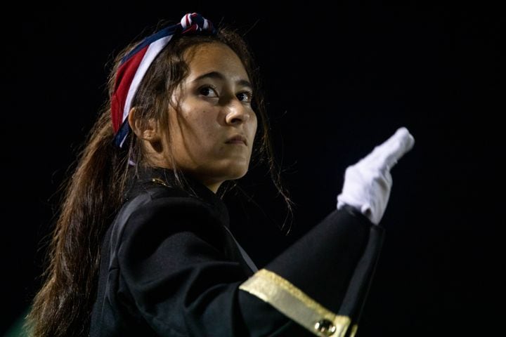 A Grayson High School drum major conducts during a GHSA high school football game between Grayson High School and Archer High School at Grayson High School in Loganville, GA., on Friday, Sept. 10, 2021. (Photo/Jenn Finch)