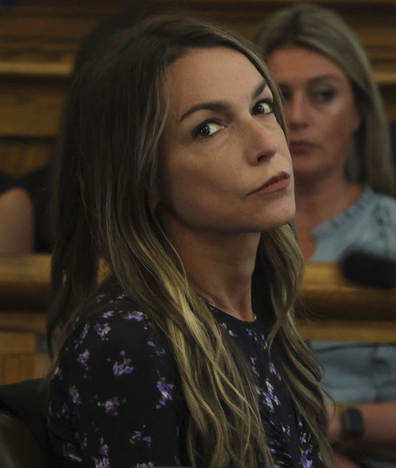 Karen Read listens during closing arguments during her trial at Norfolk Superior Court on Tuesday, June 25, 2024 in Dedham, Mass. Read is accused of killing her boyfriend Boston police Officer John O'Keefe, in 2022. (Nancy Lane/The Boston Herald via AP, Pool)