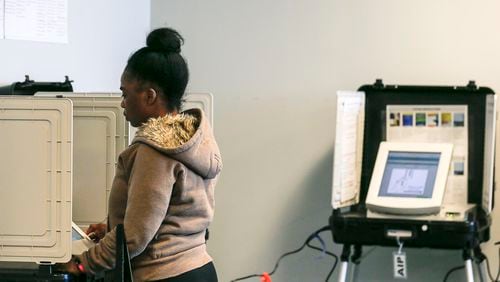 02/25/2019 -- Lawrenceville, Georgia -- A Gwinnett County resident participates in a special voting during early voting at the Gwinnett County Board of Voter Registrations and Elections building in Lawrenceville, Monday, February 25, 2019. The special ballot asks Gwinnett County residence to approve or disapprove a contract for provisions to expand public transportation to the county. (ALYSSA POINTER/ALYSSA.POINTER@AJC.COM)