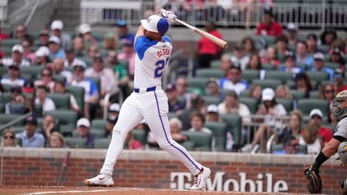 Atlanta Braves' Matt Olson (28) hits a two-run home run in the fifth inning of a baseball game against the Oakland Athletics, Saturday, June 1, 2024, in Atlanta. (AP Photo/Brynn Anderson)