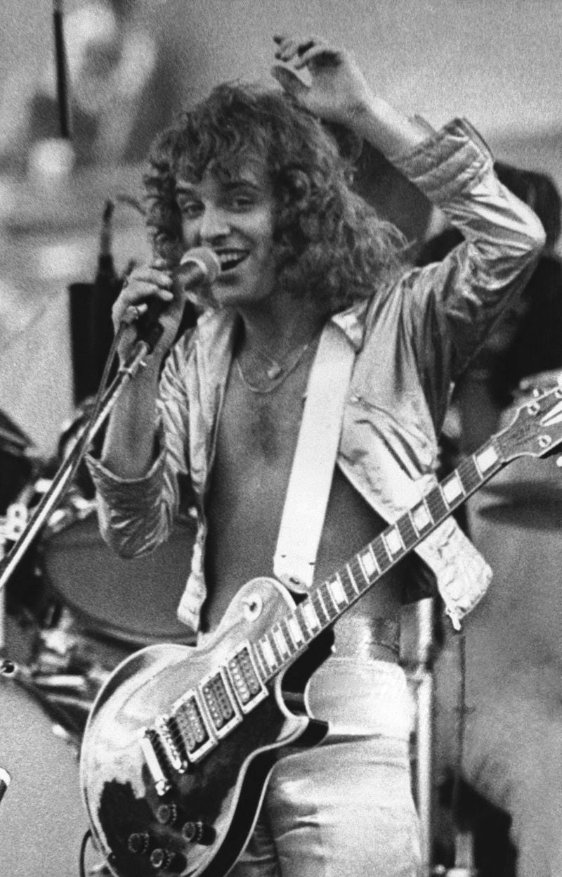 FILE - Peter Frampton performs during a concert at JFK Stadium in Philadelphia Saturday, June 11, 1977. (AP Photo/DM, File)