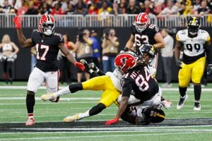 Atlanta Falcons cheerleaders perform during the first half of an NFL  football game against the Pittsburgh Steelers, Sunday, Dec. 4, 2022, in  Atlanta. The Pittsburgh Steelers won 19-16. (AP Photo/Danny Karnik Stock