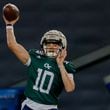 Georgia Tech quarterback Haynes King (10) attempts a pass to a wide receiver during the second day of football practice at the Brock Indoor Practice Facility on Thursday, July 25, 2024, in Atlanta. (Miguel Martinez / AJC)